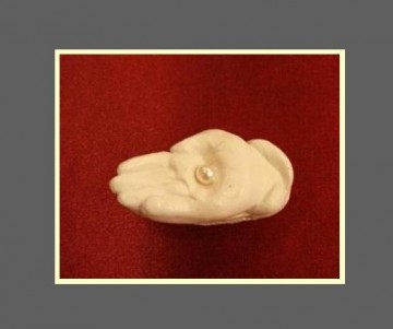 Gevouwen handje klein (in de kleur wit)